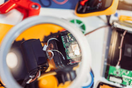 Close up of robotic car on table in engineering class at children development schoolの写真素材