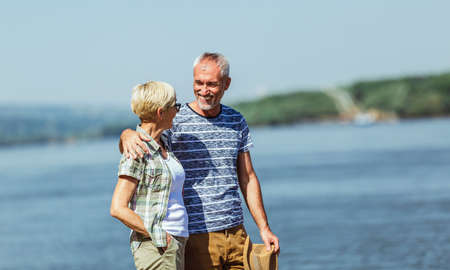 Senior couple relaxing together at the beach