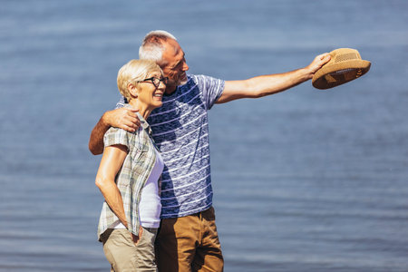 Mature couple relaxing together at the beach