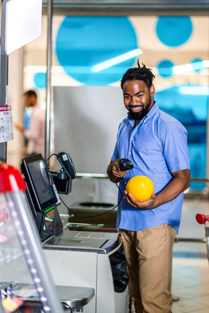 African American Man buying food at grocery store or supermarket self-checkout