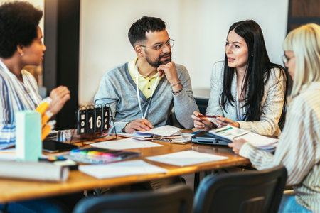 Modern business team discussing new ideas at the office. Business people on meeting in modern office.の写真素材