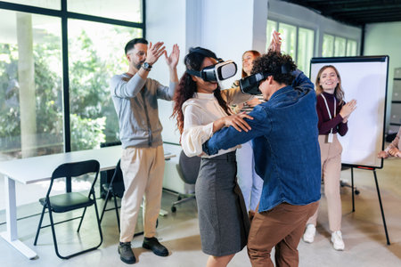 Business people making team training exercise during team building seminar using VR glassesの写真素材