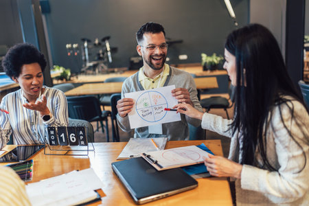 Business people on meeting in modern office. Colleagues smiling and talking at board room. Brainstormingの写真素材