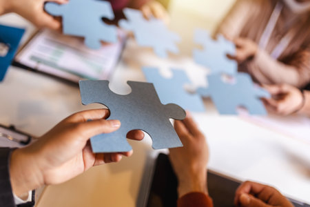 Group of professional people playing puzzle in the office.Team Buildingの写真素材