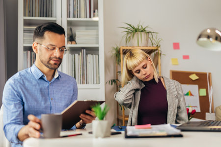 Portrait of young business people working together in home office. Couple teamwork startup conceptの写真素材