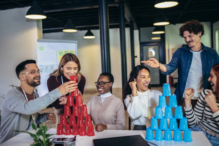 Young business people working together in the modern office have fun with the ball.の写真素材