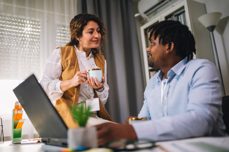 Portrait of young business people working together in home office. Couple teamwork startup conceptの写真素材