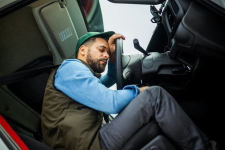 Truck driver feeling tired during the ride.