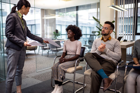 Multiethnic business people waiting for job interview.