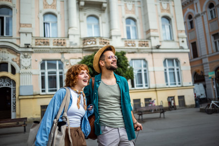 Young couple on a vacation exploring the city.の写真素材