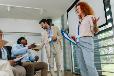 Group of multiracial business people having coffee break from a business meeting.の写真素材