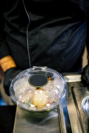 Healthy organic salad packed in a plastic container.の写真素材