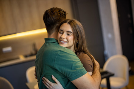Portrait of happy young couple embracing each otherの写真素材