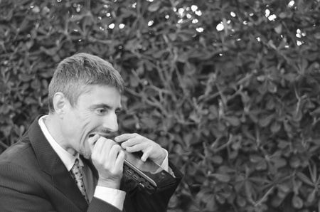 Business Man Outdoor Desperate with his Notebook, Italyの写真素材