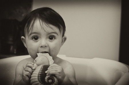 1 Year Old Baby Girl Making Bath, Italyの写真素材
