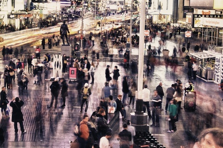 New York City, NY - March 8: A protographer tries to set up his camera and compose the right picture while traffic flows on Fifth Avenue on March 8, 2012 in New York City, U.S.A.のeditorial素材