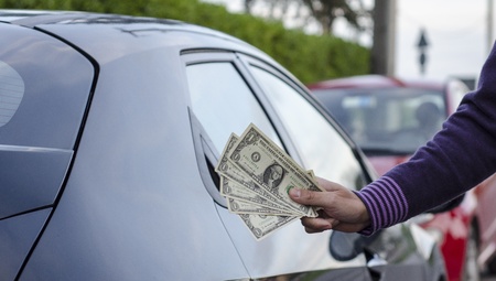 Making Money Selling Cars, Man shows Dollarsの写真素材