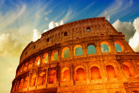 Beautiful dramatic sky over Colosseum in Rome.の写真素材