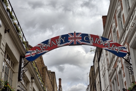 Carnaby Street Sign with Buildings on a overcast autumn afternoon - London - UKのeditorial素材