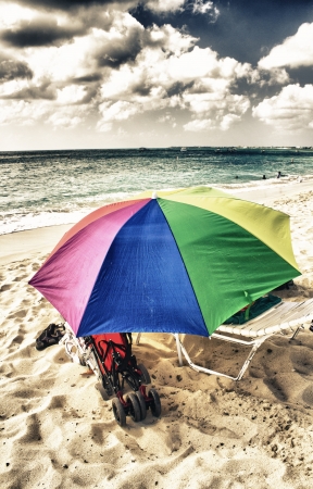 Sandy Beach with colorful Beach Umbrella, Caribbeanの写真素材