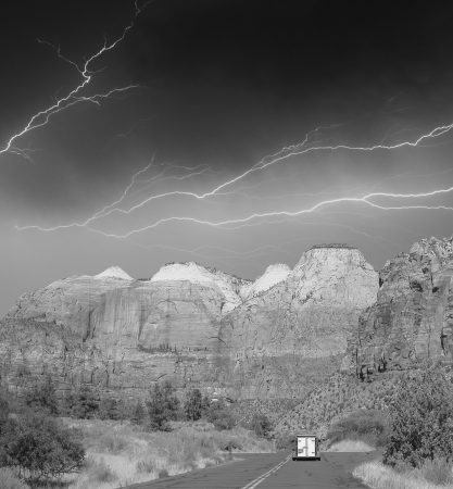 Zion Park, USA. Beautiful colors and typical red street with storm.の写真素材