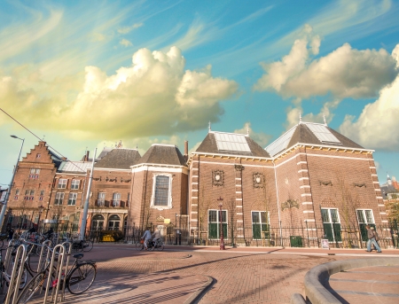 Amsterdam, Netherlands. Beautiful classic buildings with colourful sky.のeditorial素材