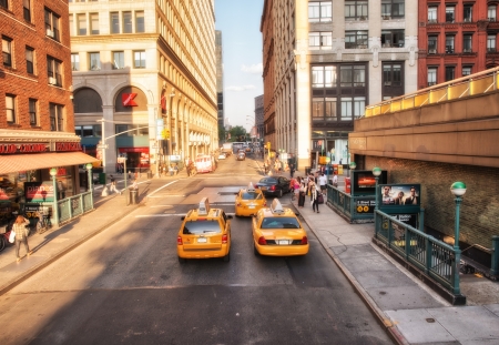 NEW YORK - MAY 14: Yellow cabs speed up in the city, May 14, 2013 in New York City. The Big Apple has more than 13,000 taxis のeditorial素材