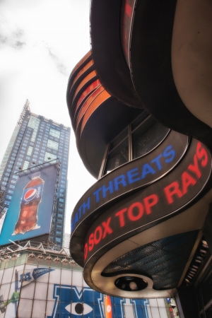NEW YORK CITY - JUN 11: Times Square, featured with Broadway Theaters and huge number of LED signs, is a symbol of New York City and the United States, June 11, 2013 in Manhattan, New York City.のeditorial素材