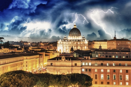 Buildings of Rome with Vatican St Peter Dome in background - sunset view.