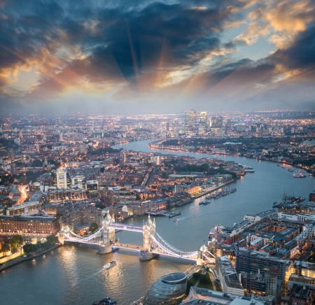 London. Aerial view of Tower Bridge at dusk with beautiful city skyline.の写真素材