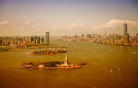 The Statue of Liberty, Manhattan and Jersey City skyline, aerial view.の写真素材