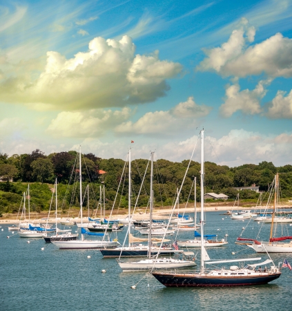 Beautiful port at dusk with small boats anchored.の写真素材