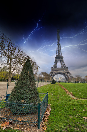 Wonderful view of Eiffel Tower from Champs de Mars Gardens. La Tour Eiffel with dramatic sky.のeditorial素材