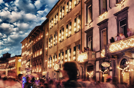 Lungarni in Pisa during San Ranieri Luminaria festival in June.の写真素材