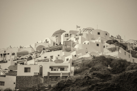 Mediterranean village of Oia at dusk, Santorini Island - Greece.の写真素材