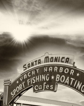 Sign welcoming visitors to the Santa Monica pier located in Santa Monica, California.の写真素材