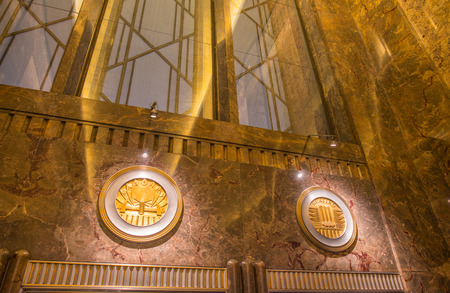 NEW YORK - JUNE 2013: The Empire State Building entrance hall decorations, New York City. After the terrorist attack on 9/11/01, this is the tallest building in New York and 3rd in USAのeditorial素材