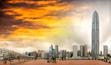 Sunset over Hong Kong. City skyline from the pier.