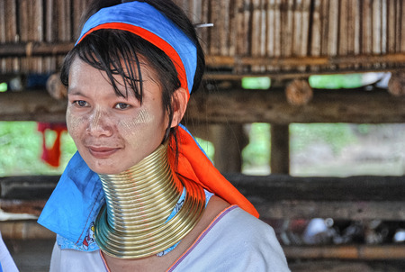CHIANGMAI, THAILAND - AUG 11: Karen Long Neck hill tribe village (Baan Tong Lhoung), Long Neck woman in traditional costumes, August 11, 2009 in Chiangmai, Thailand. Women put brass rings on their neck when they are 5 or 6 years old.のeditorial素材