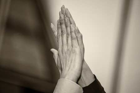 Business man and woman giving five, hands detail.の写真素材