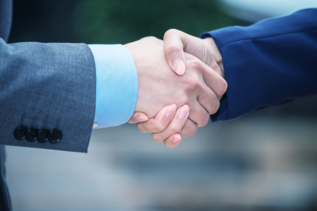 Business handshaking outdoor.の写真素材