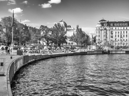 STOCKHOLM - JUNE 24, 2007: Locals and tourists enjoy city life. Every year 10 million people visit the city.のeditorial素材