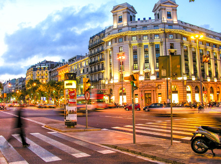 BARCELONA - MAY 26, 2005: City streets at night in spring. The city is visited by more than 7...