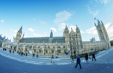 LONDON - SEPTEMBER 28, 2012: Tourists enjoy the view of Westminster Palace on a beautiful day. London attracts more than 15 million people every year.のeditorial素材