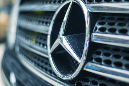HONG KONG - APRIL 15: Mercedes Benz Sign Close-Up on April 15, 2014 in Hong Kong. Mercedes-Benz is a...