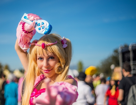LUCCA, ITALY - NOV 1: Cosplay poses for camera during Lucca Comics Festival on November 1st, 2014 in Lucca, Italy. Lucca Comics is one of the biggest event for comics and cartoons In Europeのeditorial素材