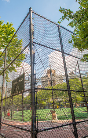NEW YORK - JUNE 15, 2013: Chelsea Park sport field in Manhattan. The park has track, soccer field that doubles as a football and softball and kickball field.のeditorial素材