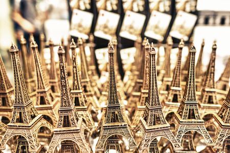 PARIS - MAY 21, 2014: Miniatures of Effel Towers. The tower is the most visited monument in France.のeditorial素材