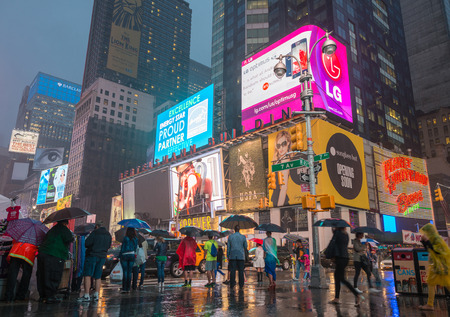 NEW YORK CITY - MAY 27: A wet Times Square May 27, 2013 in New York, NY. Times Square is the world's...