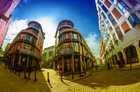 LONDON - SEPTEMBER 27, 2013: Tourists walk along city streets. The city is visited by more than 30...